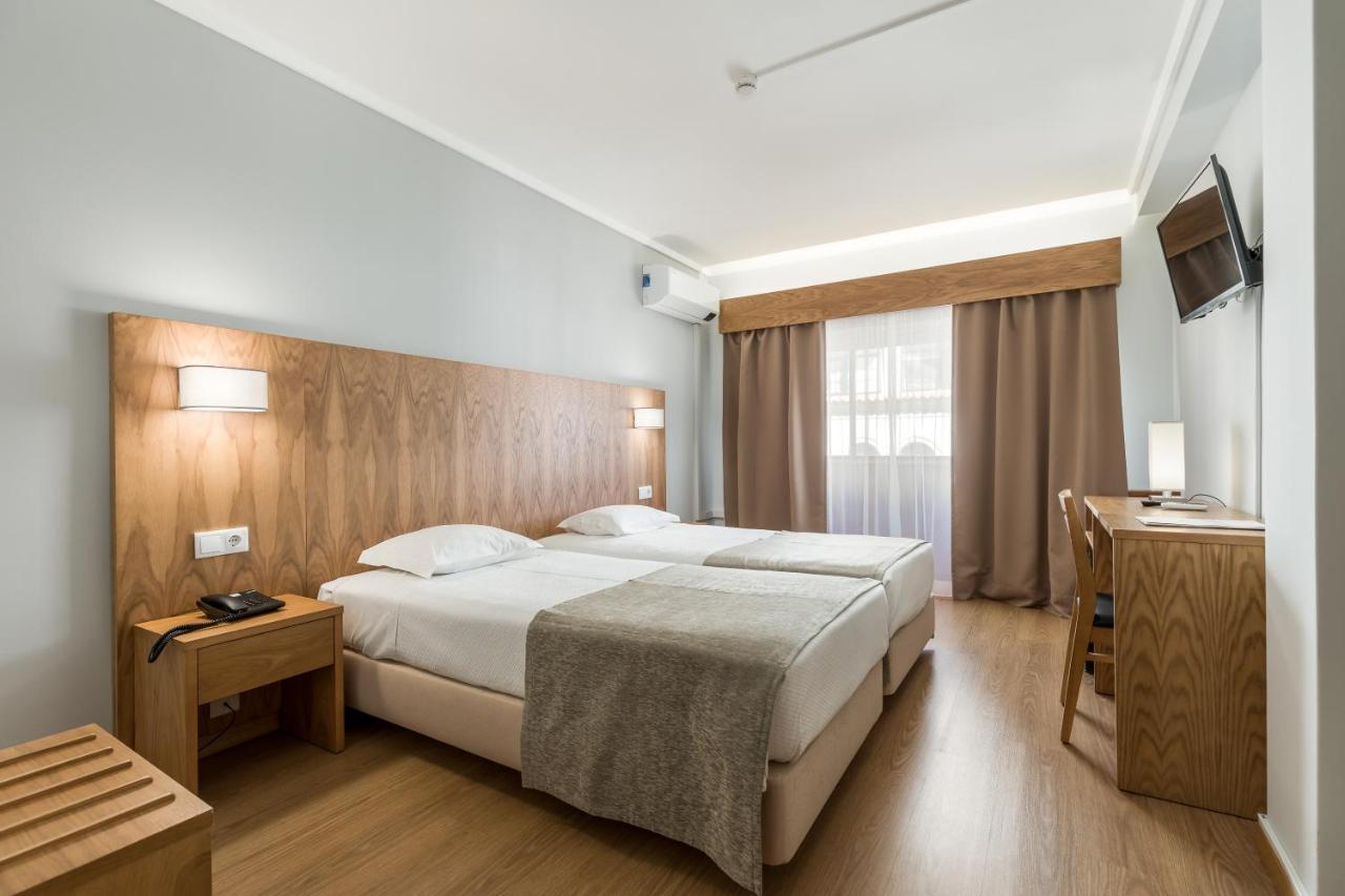 Quarto Twin com Varanda